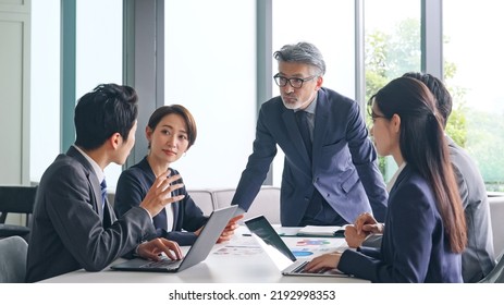 Group of various generation businessperson meeting in the office. Management strategy. - Shutterstock ID 2192998353
