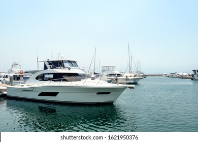 Group Of Various Luxury Yachts And Fishing Boats Parked At Pier Near Nelson Bay Of New South Wales, Australia