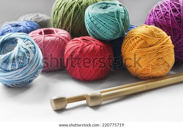 Yarn ball with knitting needles