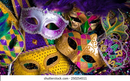 A Group Of Venetian, Mardi Gras Mask Or Disguise On A Dark Background