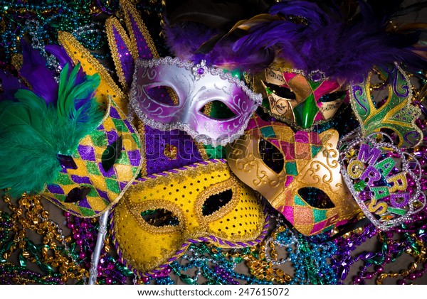 A group of venetian, mardi gras mask or\
disguise on a dark background