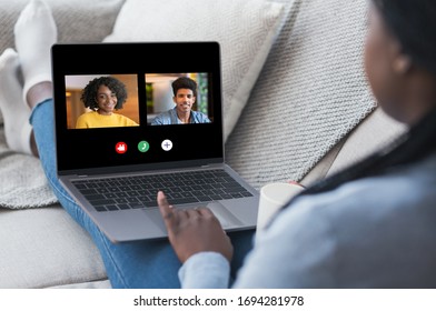 Group Video Chat. African American Woman Having Online Conference Call On Laptop With Friends, Communicating In Internet During Quarantine Isolation