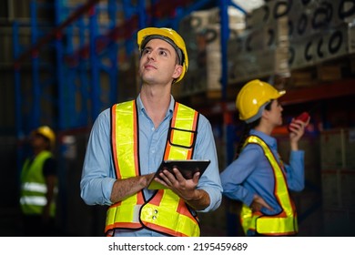 A Group Of Warehouse Workers Inspecting The Logistics Of A Large Retail Warehouse. Workers Or Warehouse Workers In Warehouses In Retail Warehouses. Work In Logistics. Work In A Warehouse.