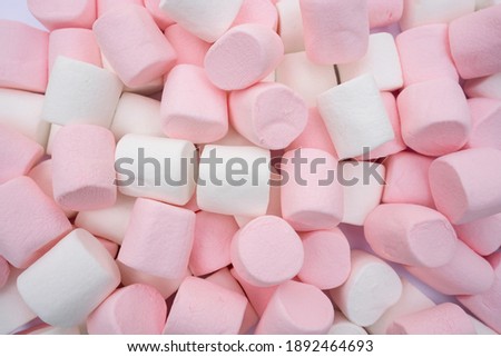 group of white and pink marshmallows