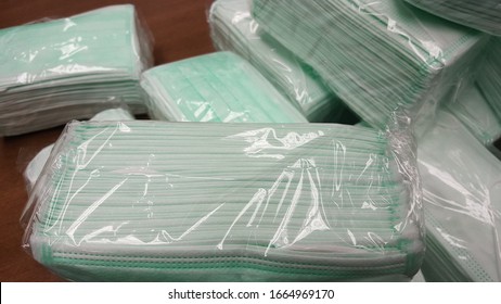 Group Of White And Surgical Mask on Table