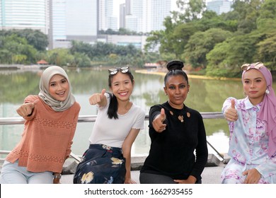 Group Of Woman Malay Chinese Indian Asian Malaysian Outdoor Green Park Lake Nature Happy Thumbs Up Gesture 