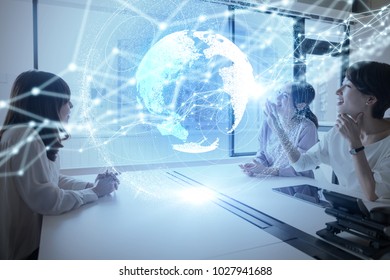 Group of woman using holographic interface. - Powered by Shutterstock