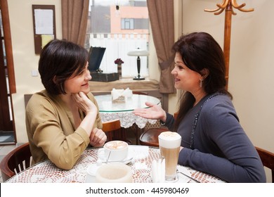 A Group Of Women 40 Years Of Talking In A Small Cafe