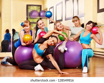 Group women in aerobics class.
