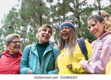 Group Of Women With Different Ages And Ethnicities Having Fun Walking In The Woods - Adventure And Travel People Concept 