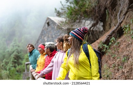 Group Of Women With Different Ages And Ethnicities Having Fun Walking In The Woods - Adventure And Travel People Concept