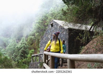 Group Of Women With Different Ages And Ethnicities Having Fun Walking In The Woods - Adventure And Travel People Concept