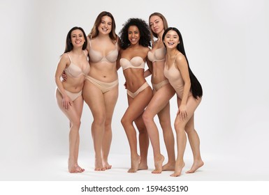 Group Of Women With Different Body Types In Underwear On Light Background