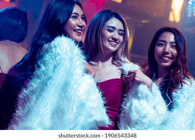 Group Of Women Friend Having Fun At Party In Dancing Club At Night . Social Gathering Event And Nightlife Entertainment Concept .