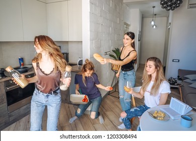 Group Of Women Having Fun In The Kitchen