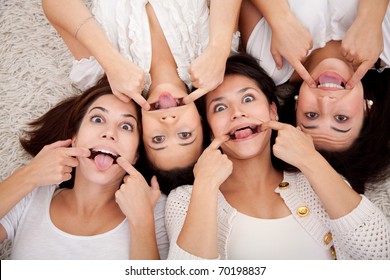 Group Women Lying On The Floor Making Funny Faces