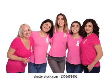 Group of women with silk ribbons on white background. Breast cancer awareness concept - Shutterstock ID 1306651801