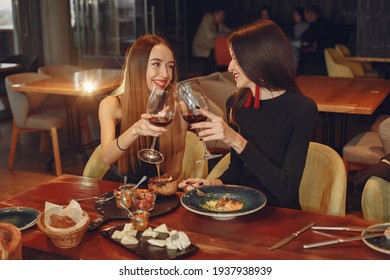 Group of women spend time at a fancy restaurant