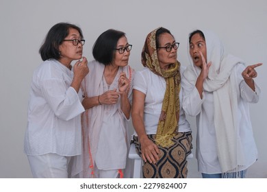 A group of women are talking about something. - Shutterstock ID 2279824007