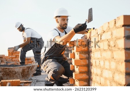 Group of workers at a construction site.