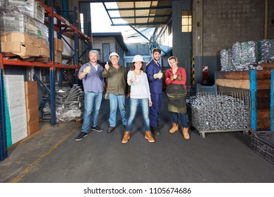 Group of workers in metallurgy factory as a successful team - Shutterstock ID 1105674686