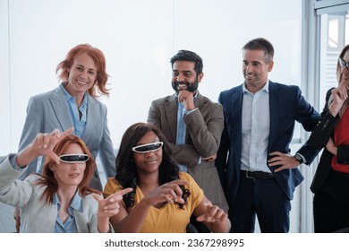 Group of workers using virtual reality tools for their new project. Concept: business, investment, technology