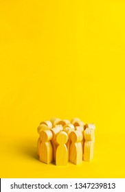 Group Of Yellow People On A Yellow Background. Crowd, Meeting, Social Activity. Society. Inert Society. Herd Instinct, Management Of People. Human Resources, Workers Stand Together. Disguise