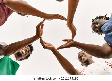Group young african american artist man smiling happy doing circle and hands together at art studio 