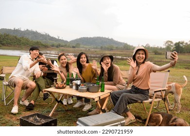 Group of young  Asian people are enjoy camping in natural campsite - Powered by Shutterstock