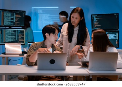 Group of young Asian Software Developers Talk,Discuss a Technological Project prompt app program nomad AI.Ux and Ui Developer Designer brainstorming algorithms on computer screen in office. - Powered by Shutterstock - Get 15% off with code: PIKWIZARD15