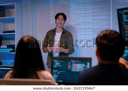 Group of young Asian Software Developers or programmer Talk,Discuss a Technological Project prompt app program nomad AI.Ux and Ui Developer Designer brainstorming algorithms on computer in office
