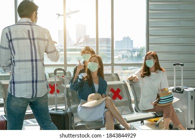 Group Of Young Asian Traveler Say Hello Greeting At The Airport.