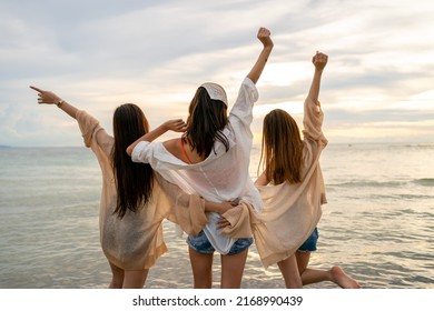 Group Of Young Asian Woman In Walking And Playing Together On Tropical Beach At Summer Sunset. Happy Female Friends Enjoy And Fun Outdoor Activity Lifestyle On Holiday Travel Vacation At The Sea