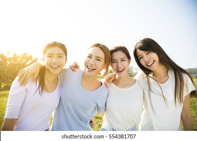 Group of young beautiful women smiling