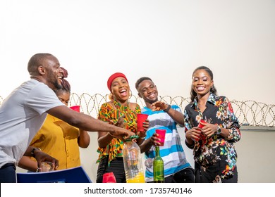 Group Of Young Black People Throwing A Party, Having A Lot Of Fun, A Reunion Party