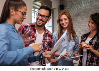 Group of young business people having fun at open space office.  - Shutterstock ID 1451714519