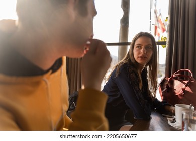 Group of young business people are having a meeting in the cafe - Shutterstock ID 2205650677