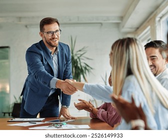 Group of young business people having a meeting shaking hands handshake introducing each other during meeting in the office. Teamwork and success concept - Powered by Shutterstock