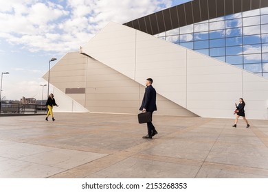 Group Of Young Business People Are Hurrying Up All Together To Their Meeting