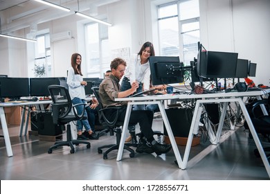 Group Of Young Business People That Working By Computers In The Modern Office.