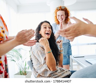 A group of young business women celebrating  in the office or in classroom - Shutterstock ID 1788414407