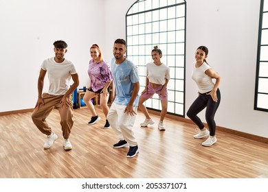 Group Of Young Dancer Smiling Happy Dancing Choreography At Dance Academy.