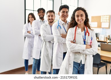 Group Of Young Doctor Smiling Happy Standing With Arms Crossed Gesture At The Clinic Office.