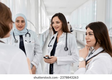 A group of young doctors in the corridor of the clinic. - Powered by Shutterstock