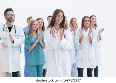 Group Of Young Doctors Give A Standing Ovation