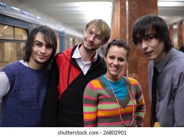 Group of young friends on subway station
