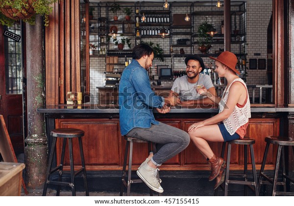 Group Young Friends Sitting Talking Cafe Stock Photo Edit Now