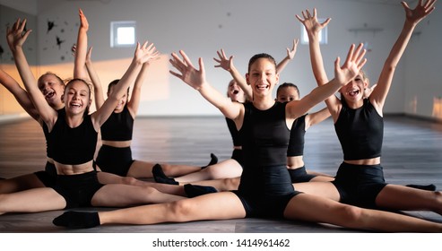 Group of young girls practicing and exercising modern ballet dance. - Powered by Shutterstock