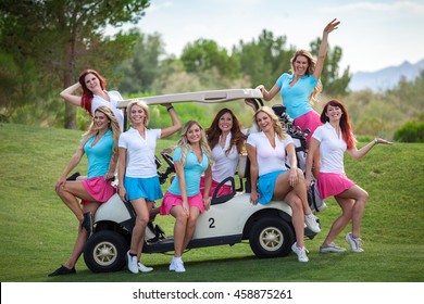 Group of young golf caddies hanging out on golf cart
