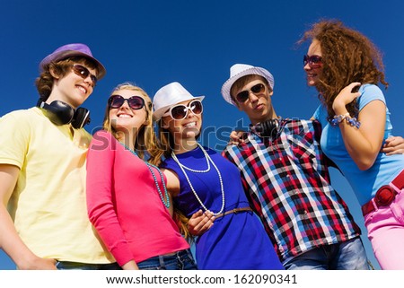 Group of young and happy people having party
